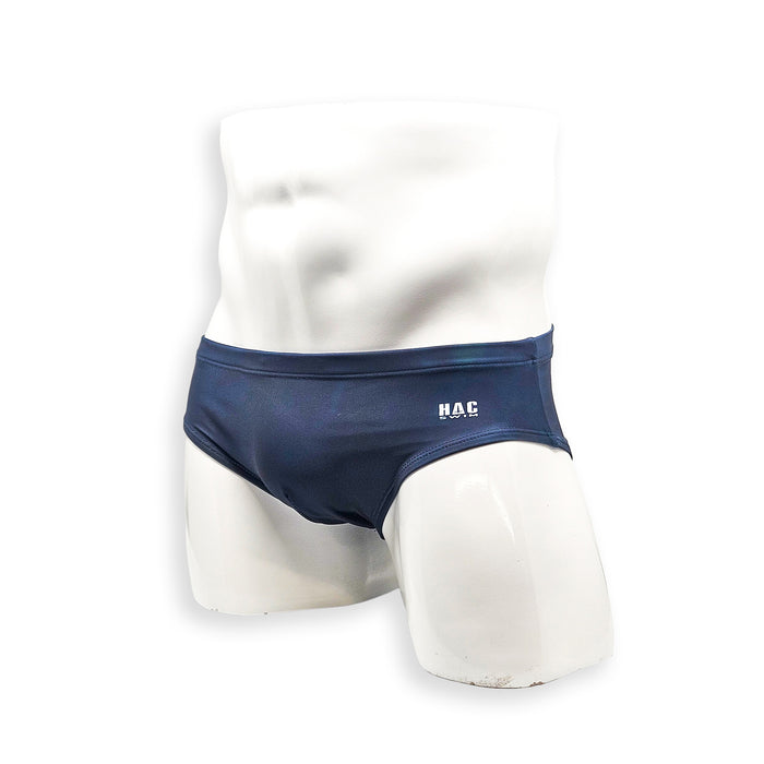 Men’s navy plumbing graphic swim brief – Basic angled front view in rich navy with clean front and minimal branding