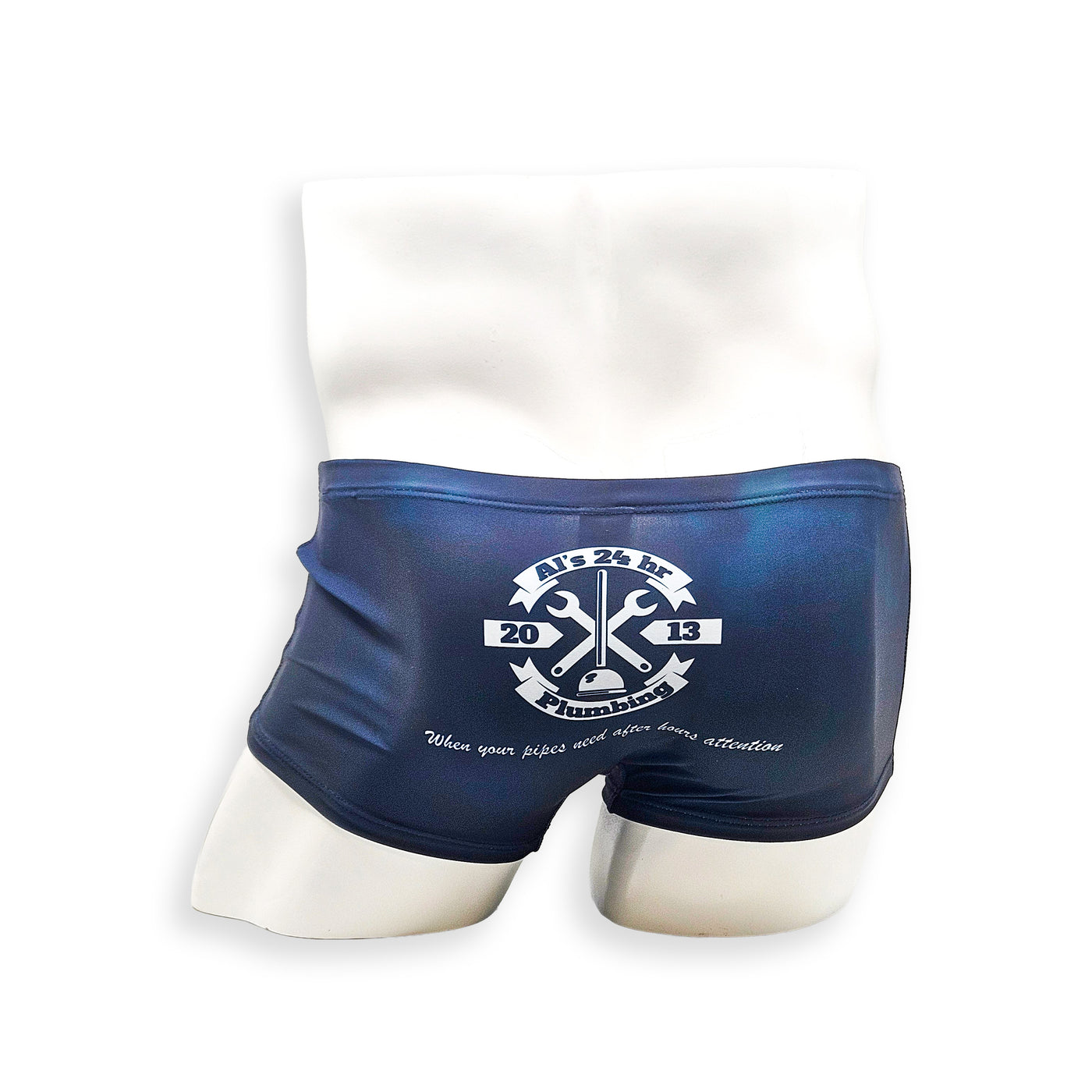 Men’s navy plumbing graphic swim trunk – Box Cut back view with wide plumbing logo graphic across rear