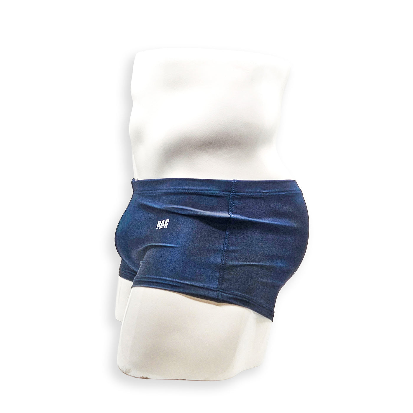 Men’s navy plumbing graphic swim trunk – Box Cut side view showing short leg and relaxed silhouette