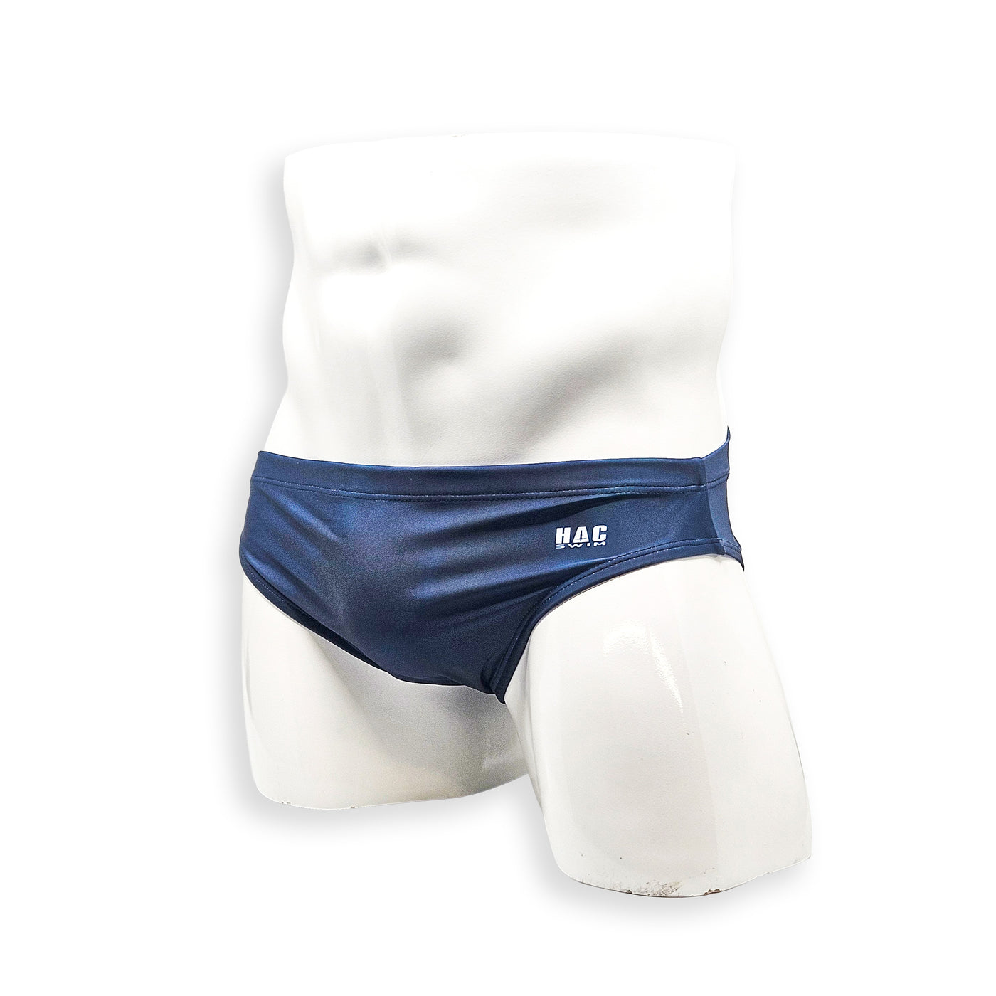Men’s navy plumbing graphic swim brief – Flat Front angled front view in rich navy with smooth flat front panel