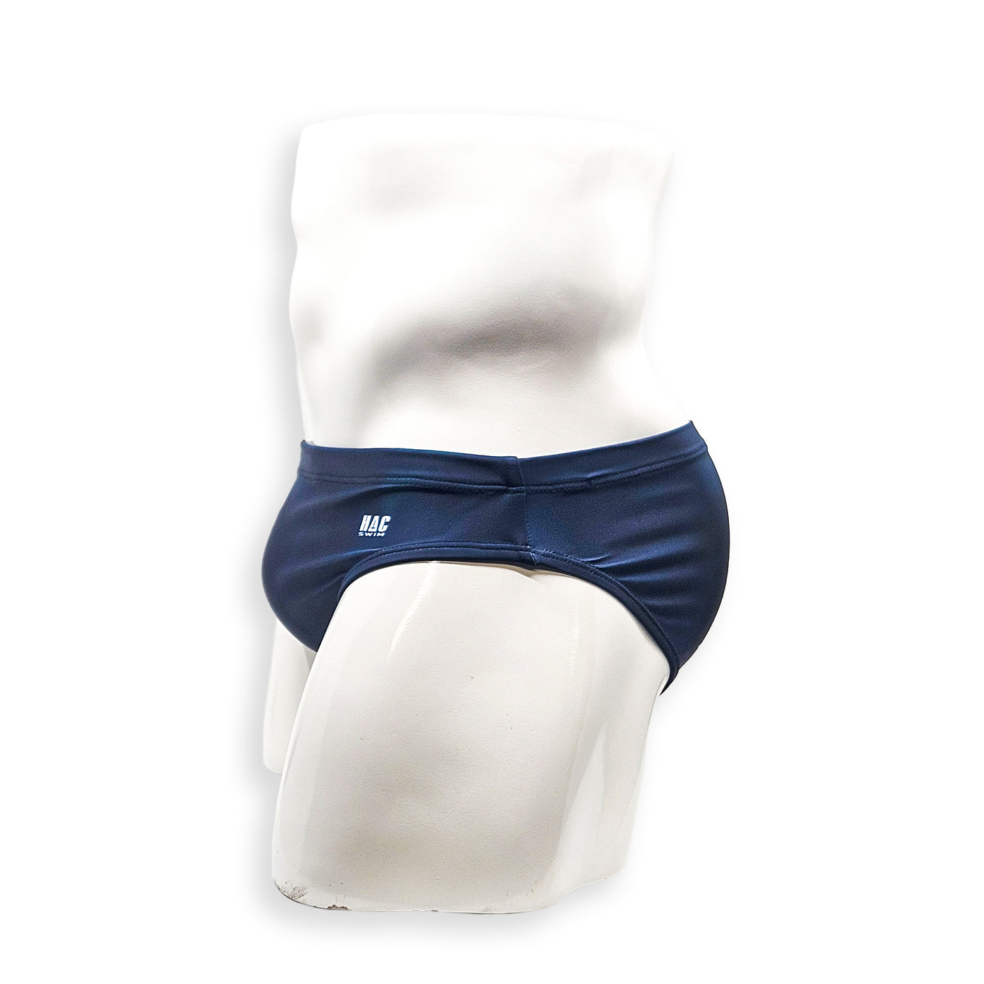 Men’s navy plumbing graphic swim brief – Flat Front side view showing minimal low-rise profile