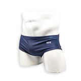 Men’s navy plumbing graphic swim brief – Vintage angled front view in rich navy with classic swim shape