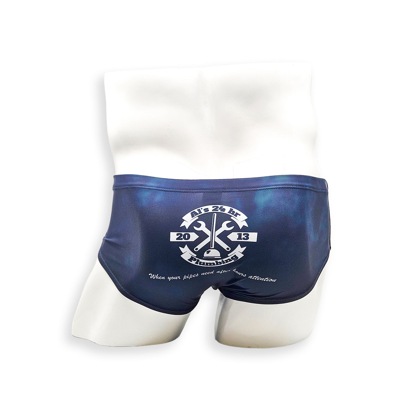 Men’s navy plumbing graphic swim brief – Vintage back view with plumbing logo graphic and full coverage