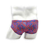 Rear view of HAC Swim Feral Summer Basic Swim Brief showing full print coverage in electric blue, hot pink and orange abstract pattern.