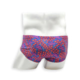 Rear view of HAC Swim Feral Summer Vintage Swim Brief showing full print coverage in electric blue, hot pink and orange abstract pattern.