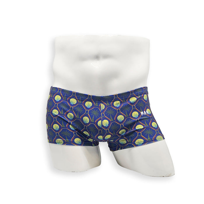 Men’s palm and shell print swim trunk – Box cut front view showing contoured front and tropical pattern
