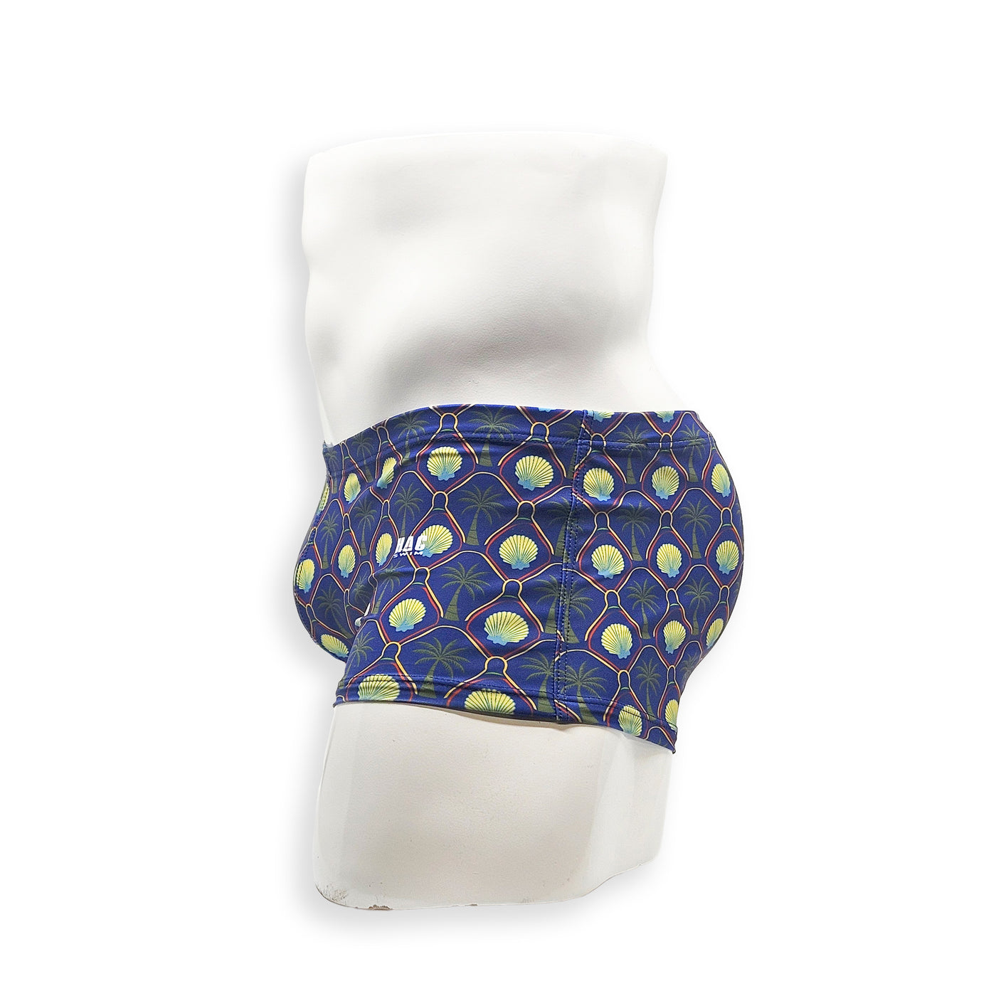 Men’s palm and shell print swim trunk – Box cut side view showing low-rise fit and square leg opening