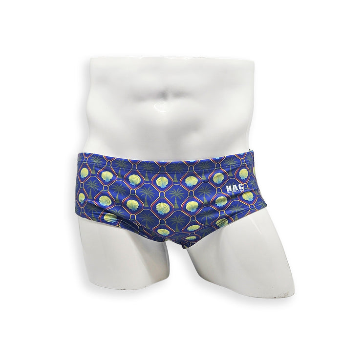 Men’s palm and shell print swim brief – Vintage cut front view showing relaxed fit and tropical pattern